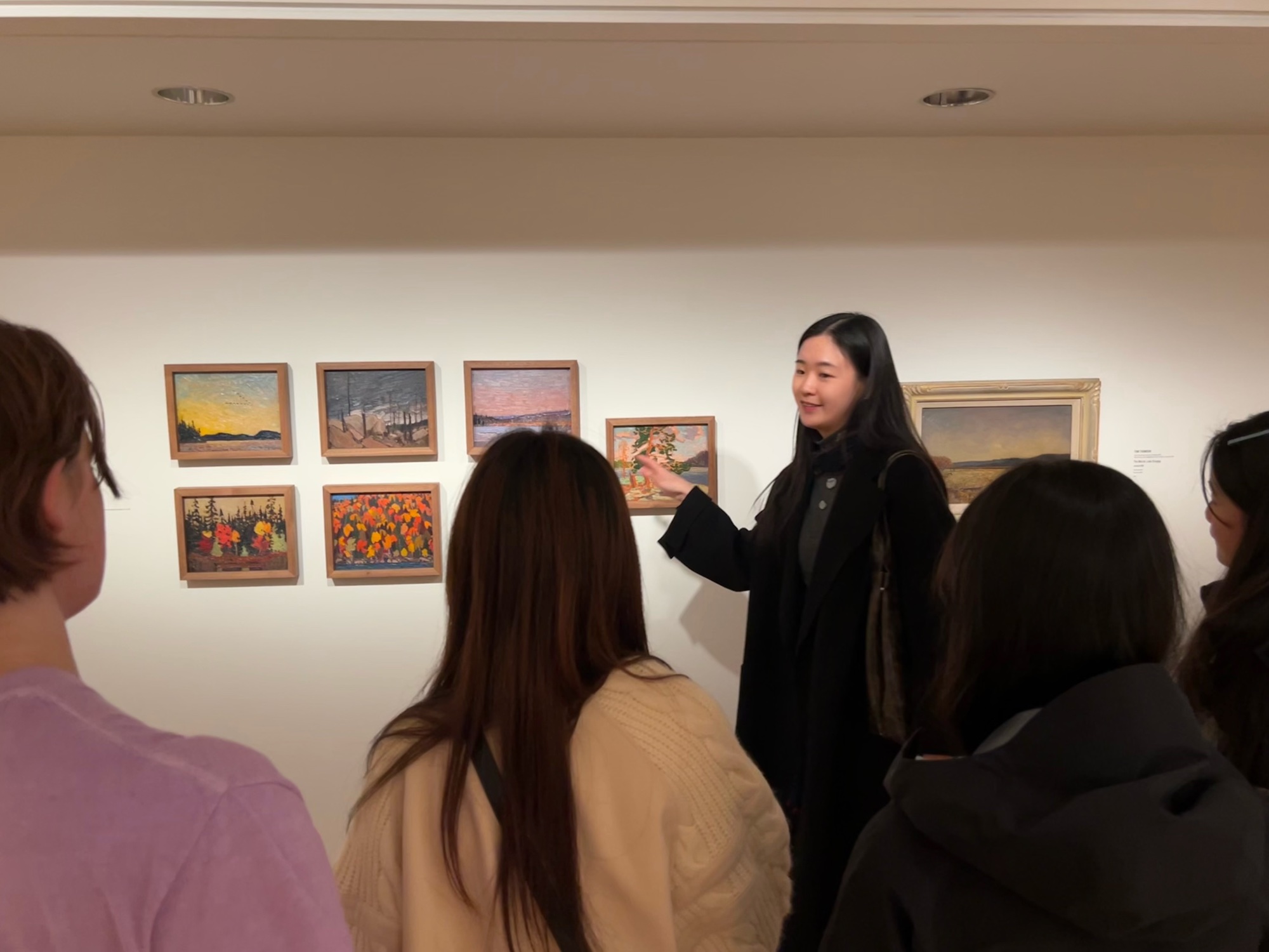 A student leading a discussion of Canadian painting